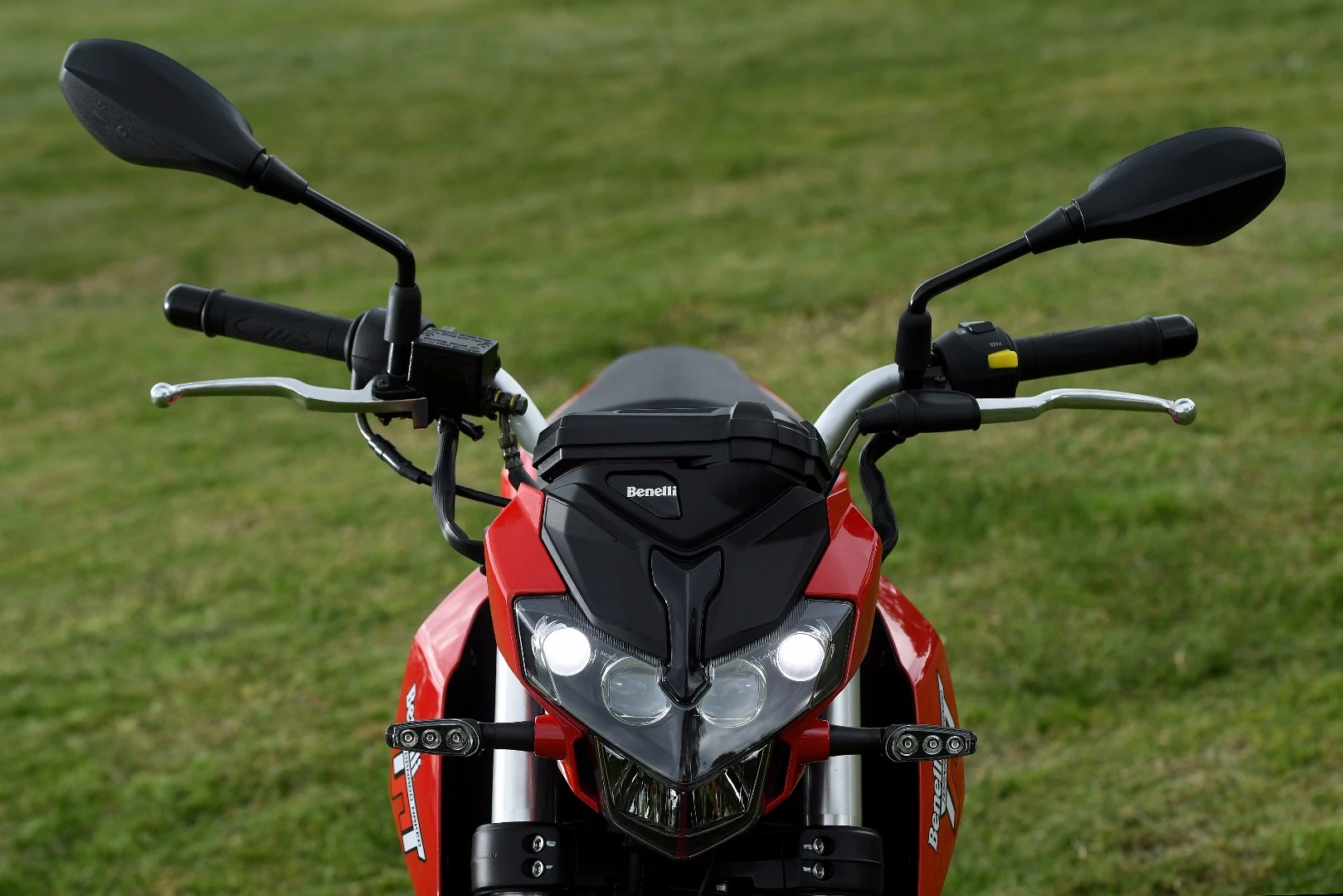 Benelli TnT125: headlight looks like the spider guy from Monsters Inc.