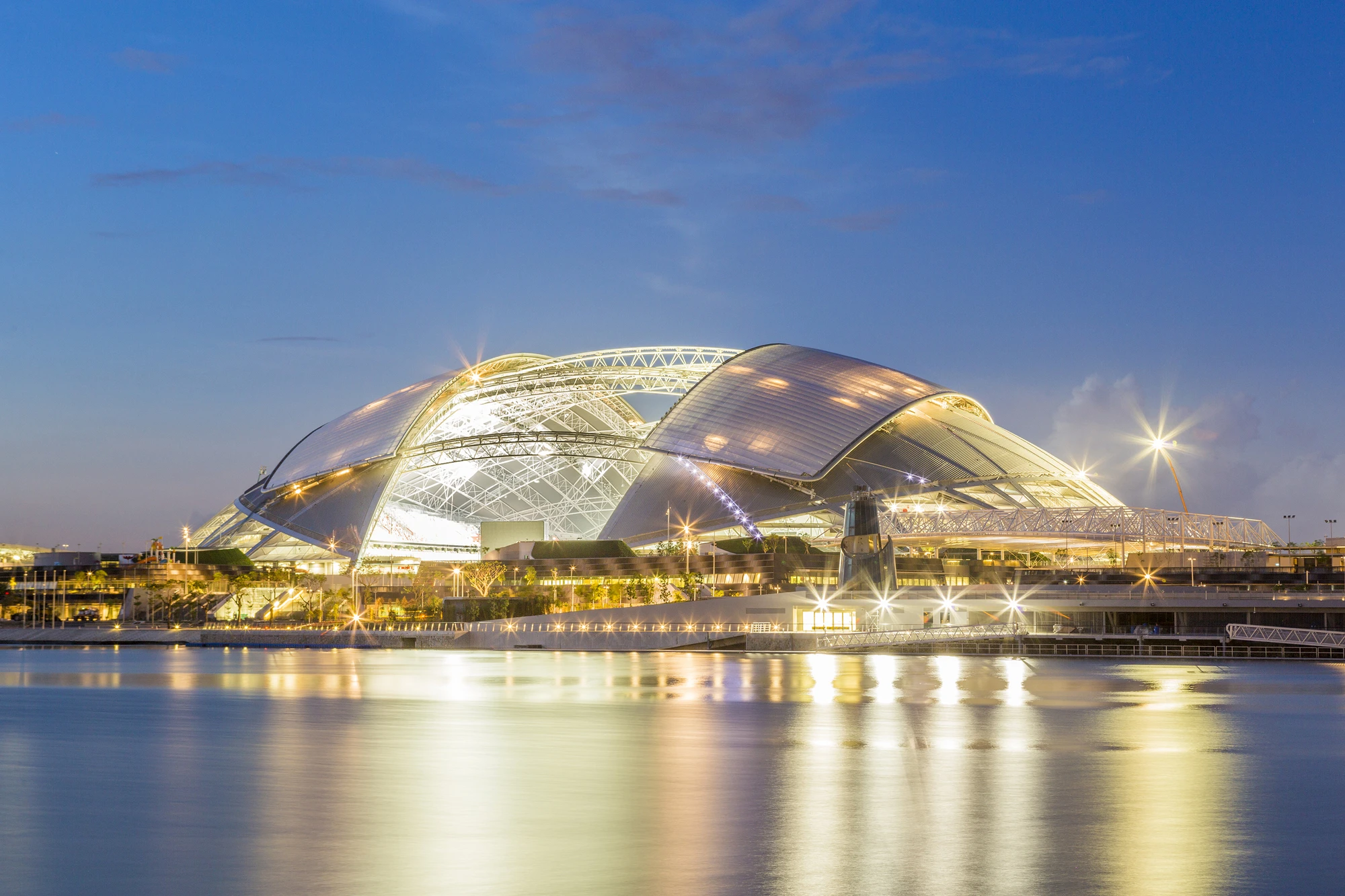 The Singapore Sports Hub, as it looks at night (Photo: DP Architects)