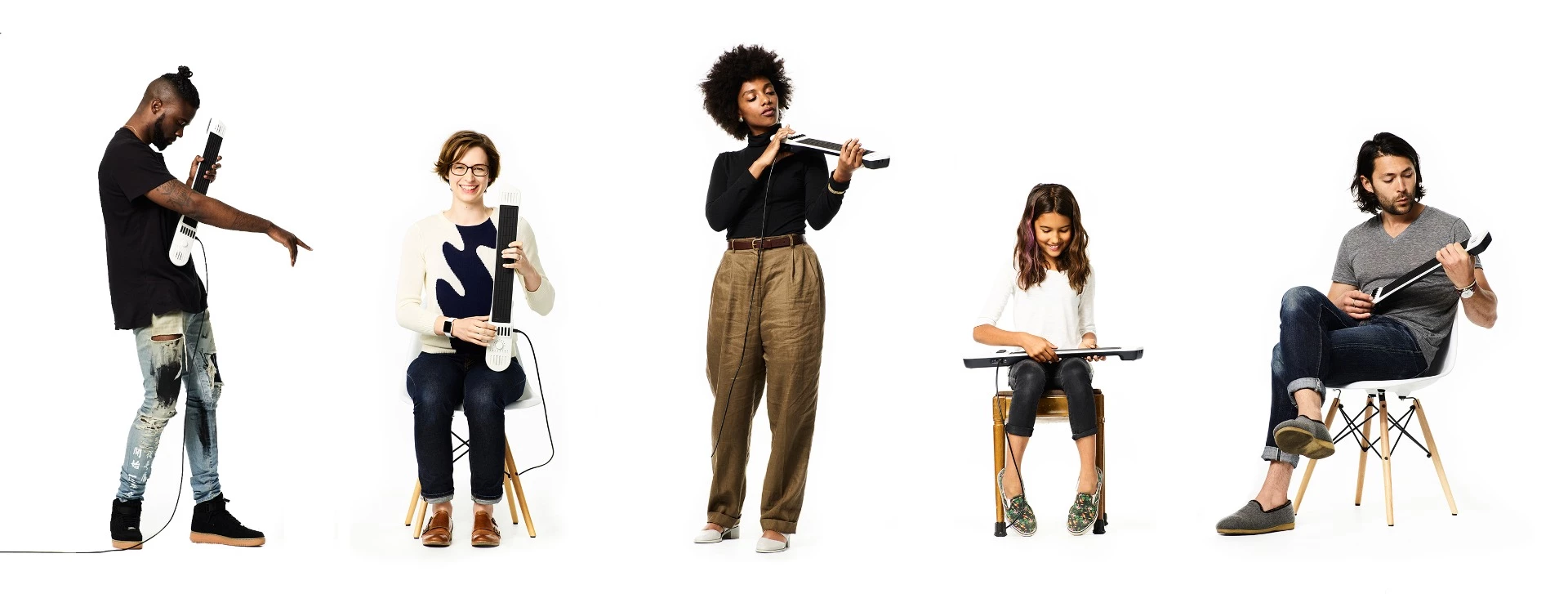 The Instrument 1 can be held like a guitar, a cello, a violin, or played on the knees like a keyboard