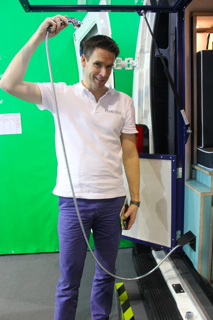 WIth an external water connection, the PlugVan supports an outdoor shower