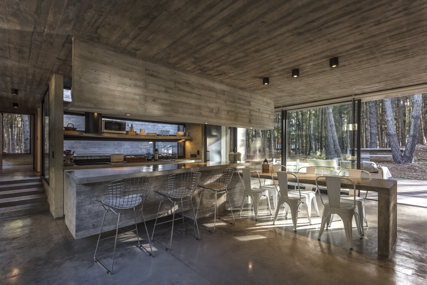 The Forest House is made from three separate blocks that stagger down a gentle hillside