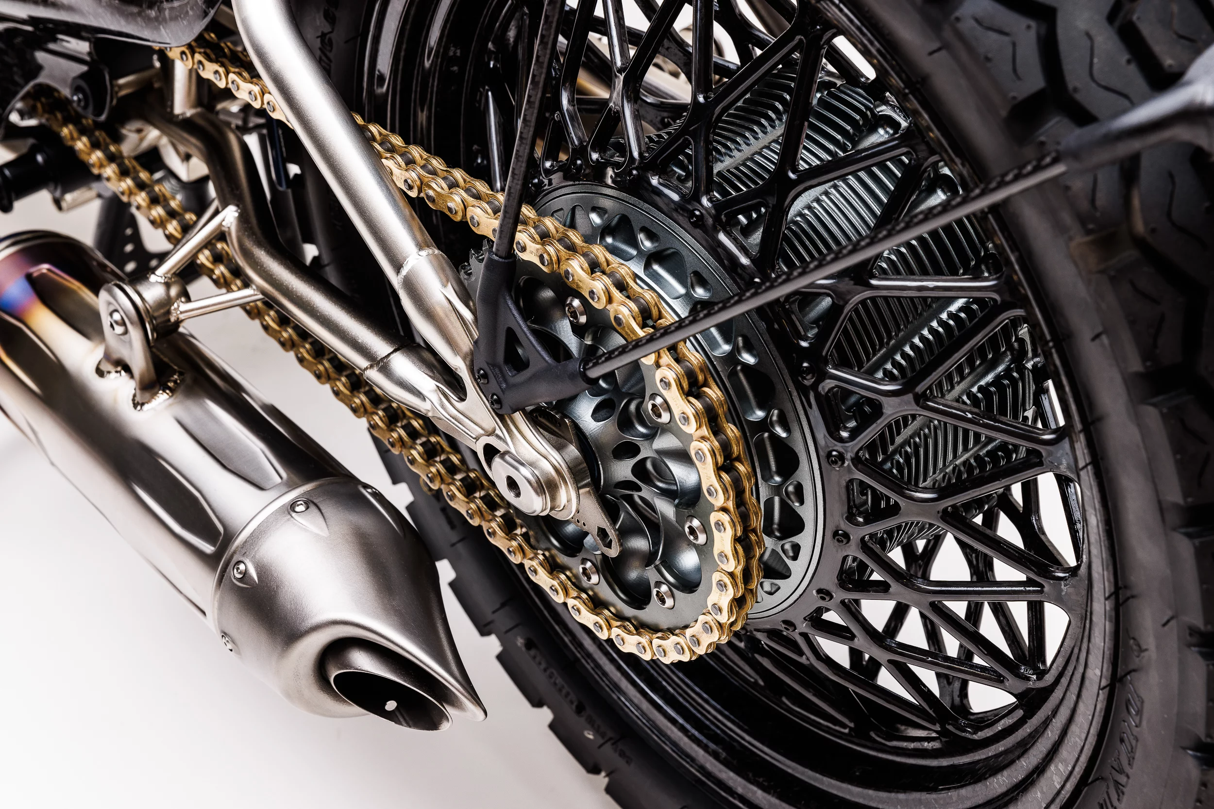 Ye gods, look at those handmade carbon rims and the titanium exhaust