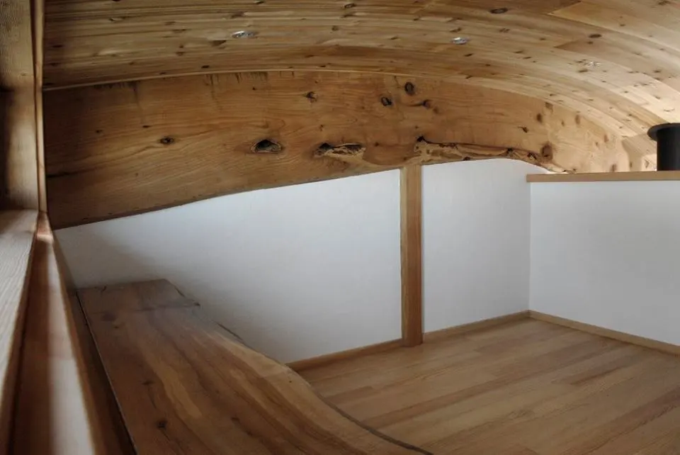 The small sleeping loft has storage space and enough room for a double bed (Credit: Jenn Walton)