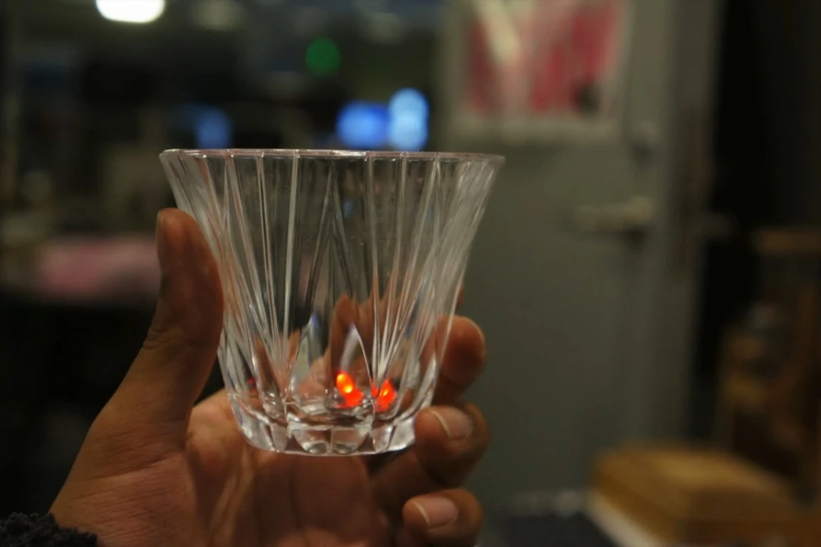With one cube of each color (green, yellow, and red) in a glass, it will seem as if the lights are changing from green to red depending on how much alcohol a person imbibes
