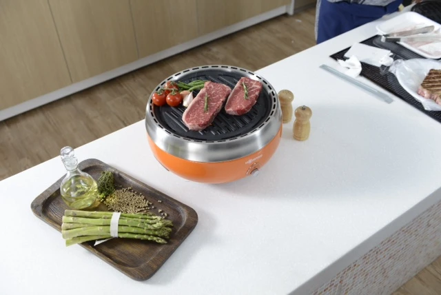 The Homping Grill improves your charcoal grilling experience