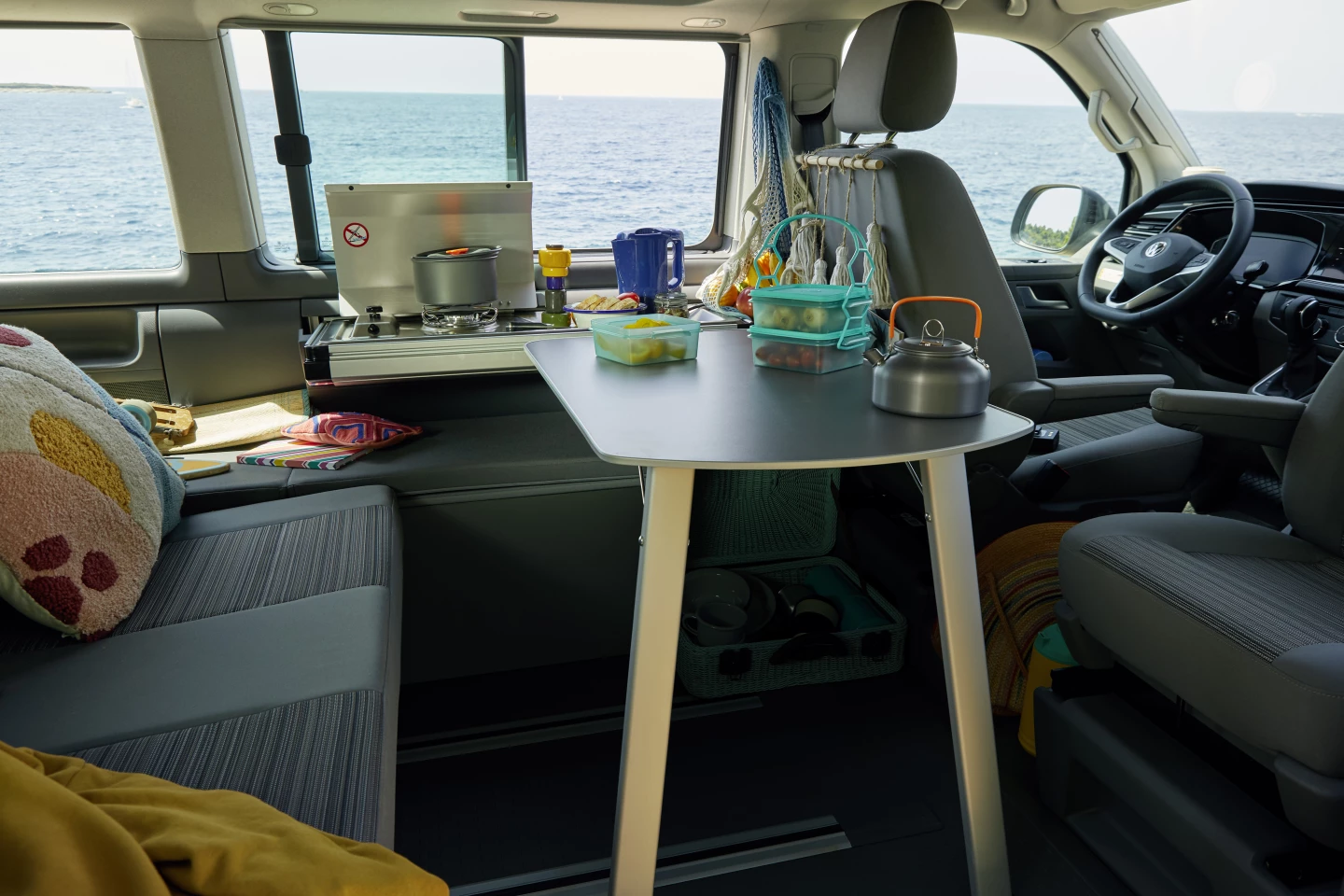 The new fold-out kitchen is the highlight of the California Beach 6.1, bringing a single-burner stove and worktop to the van