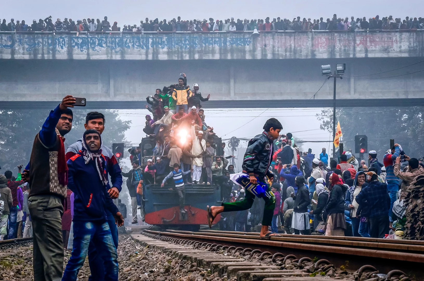 An overcrowded train takes off during Bishwa ijtema, Bangladesh's second largest Muslim congregation