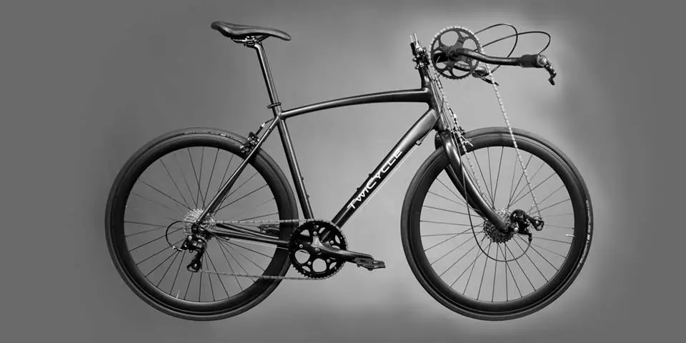 The TwiCycle has a chain running directly from the revolving handlebars to a derailleur and cassette mounted on the front wheel