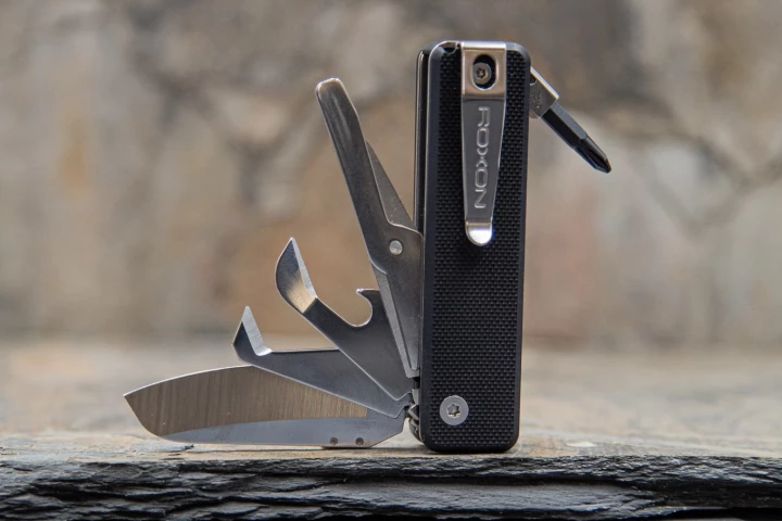 The Roxon contains four swappable implements on one side, a bit driver on the other, and a toothpick and tweezers concealed in the base