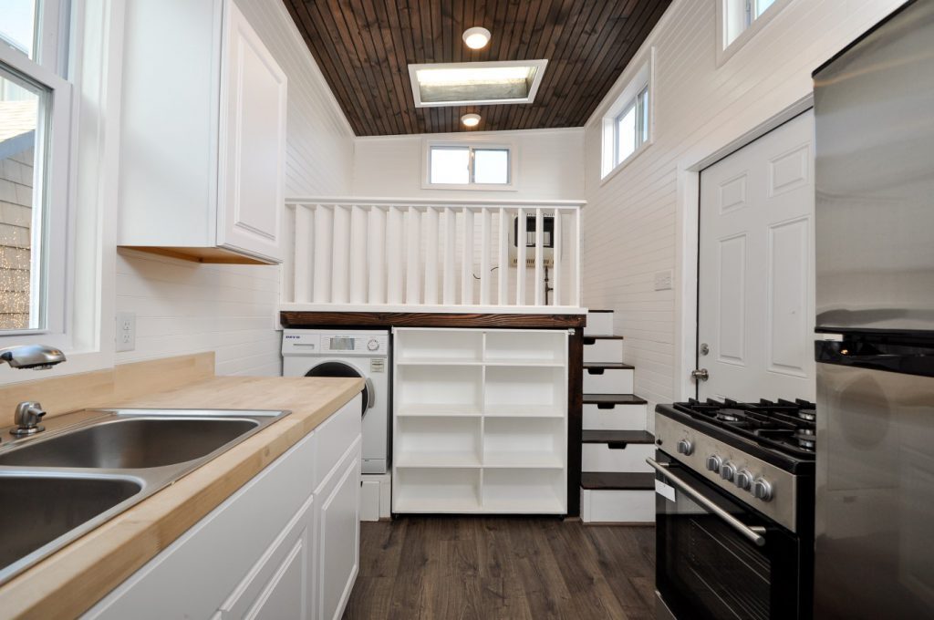 The space beneath the Jefferson's living area can be accessed by moving the bookcase pictured