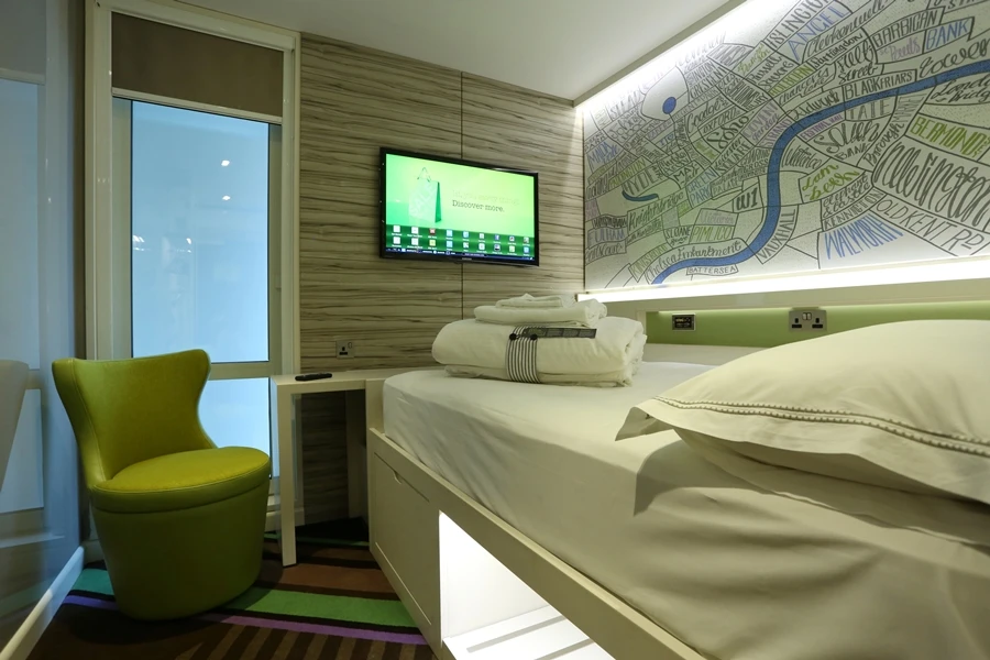 Rooms at hub by Premier Inn are designed to be "compact and clever," with desks that slide-out from the bed to save space