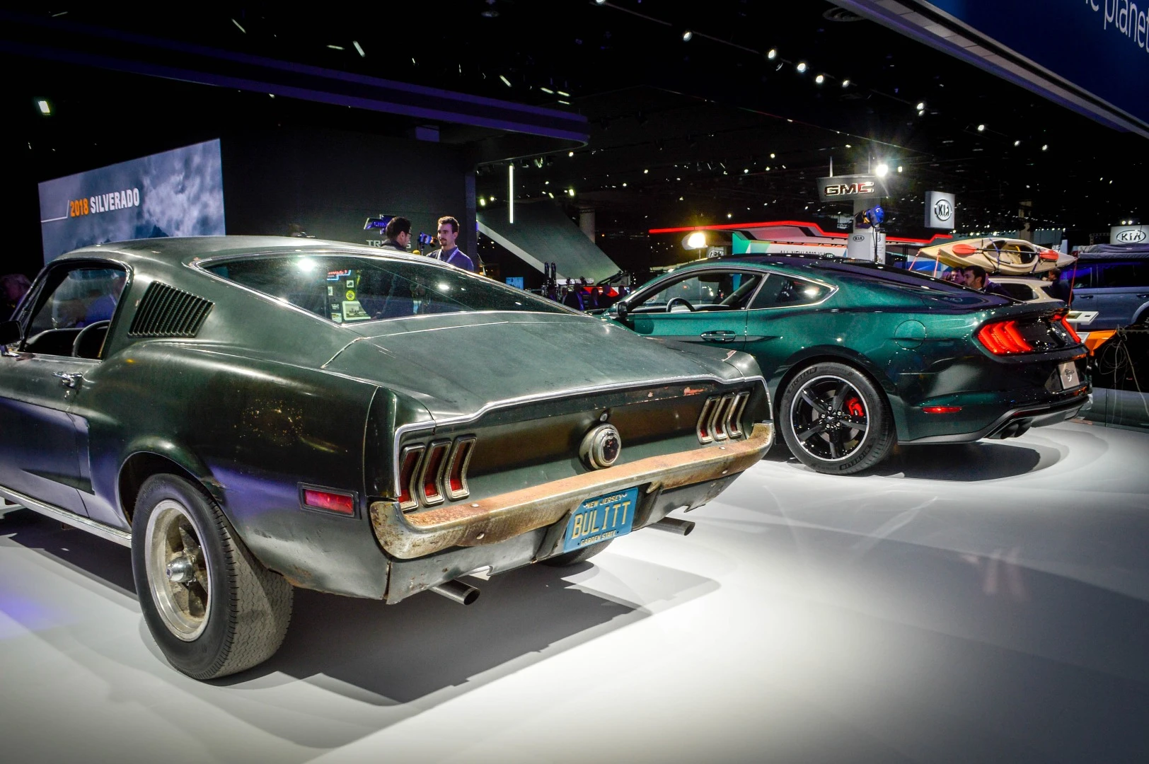 The 1968 Ford Mustang GT 390 from the movie Bullitt next to Ford's new Mustang Bullitt