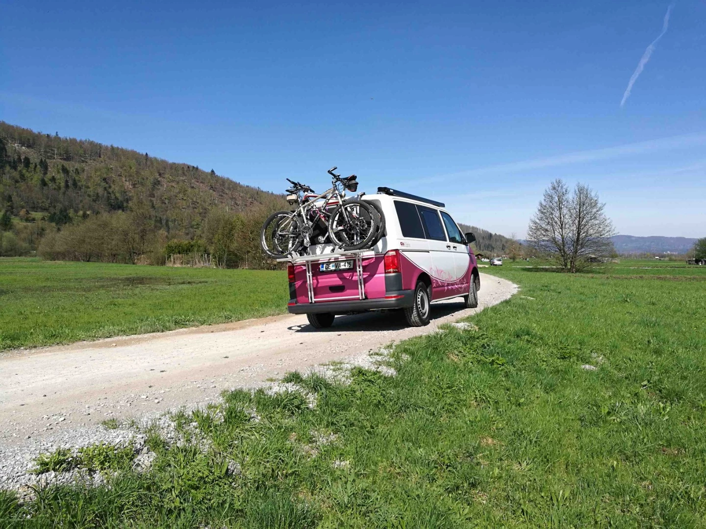 The divider wall takes away your cargo area, so you'll have to load gear up on a rack or trailer (not that you'd necessarily be fitting bikes in a Transporter camper van, anyway)