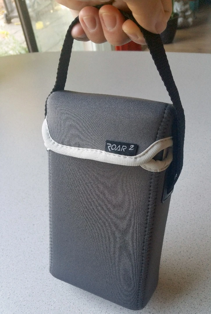 Creative Labs' neoprene case (sold separately) comes with short (shown) and long straps to carry the Sound Blaster Roar 2 speaker