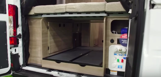 Even with the bed folded down, the Solis offers plenty of storage and pass-through, along with an underfloor cabinet