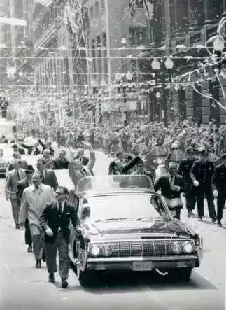 The same car being used in a ticker tape parade for astronauts