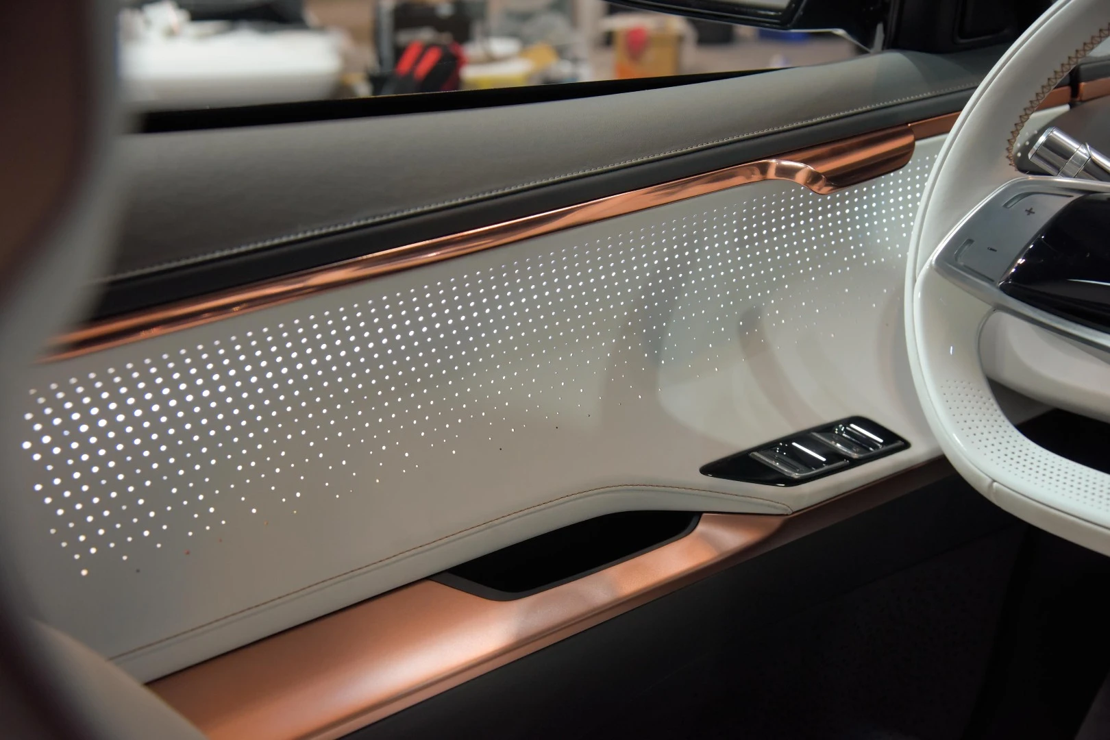 Bronze trim and silver and gray surfaces make for a clean, simple interior