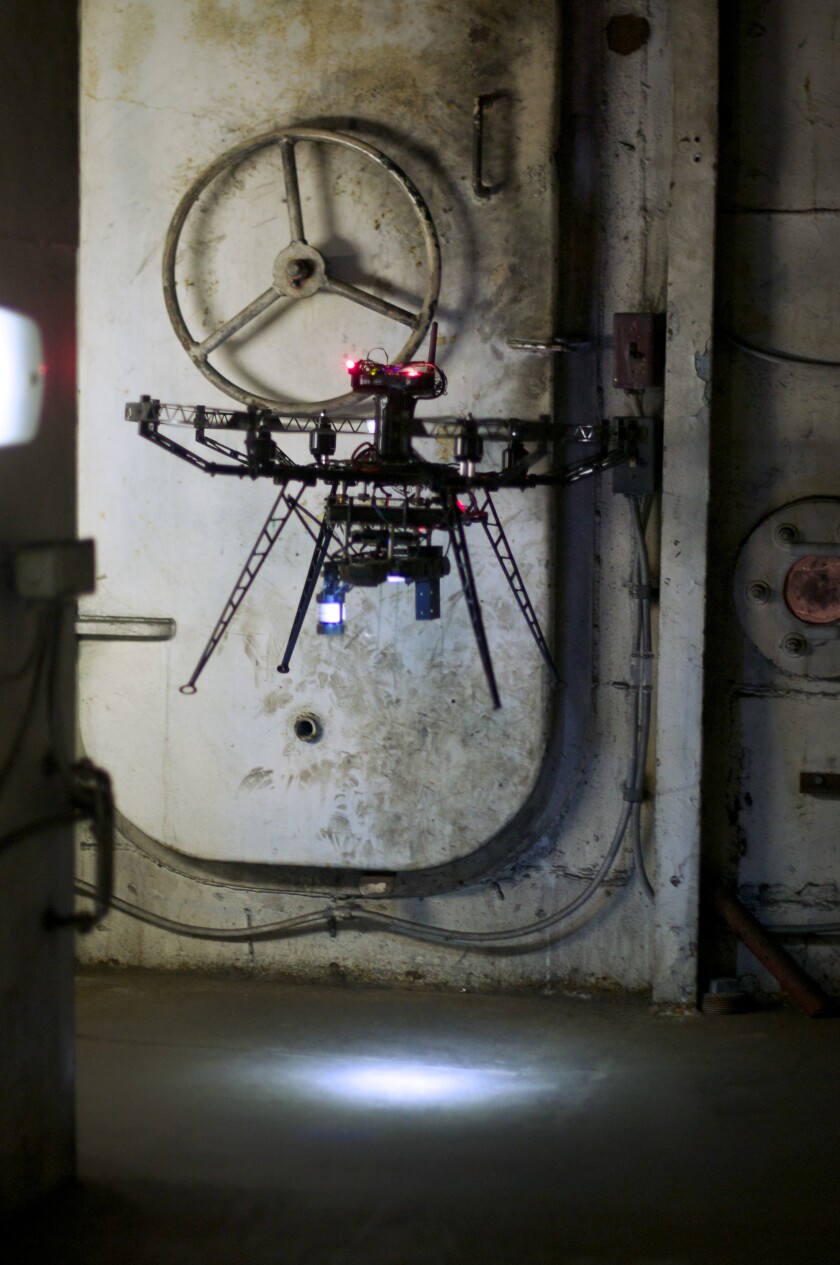 Both the drone and the robot are components of the Office of Naval Research's Damage Control Technologies for the 21st Century (DC-21) project (Photo: CMU)