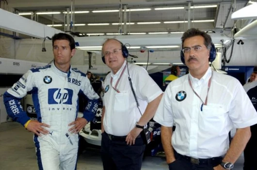 Mark Webber BMW WilliamsF1 Team driver 2005 with Prof Burkard Goeschel (Board member for Development BMW Group) and Dr Mario Theissen (BMW Motorsport Director)