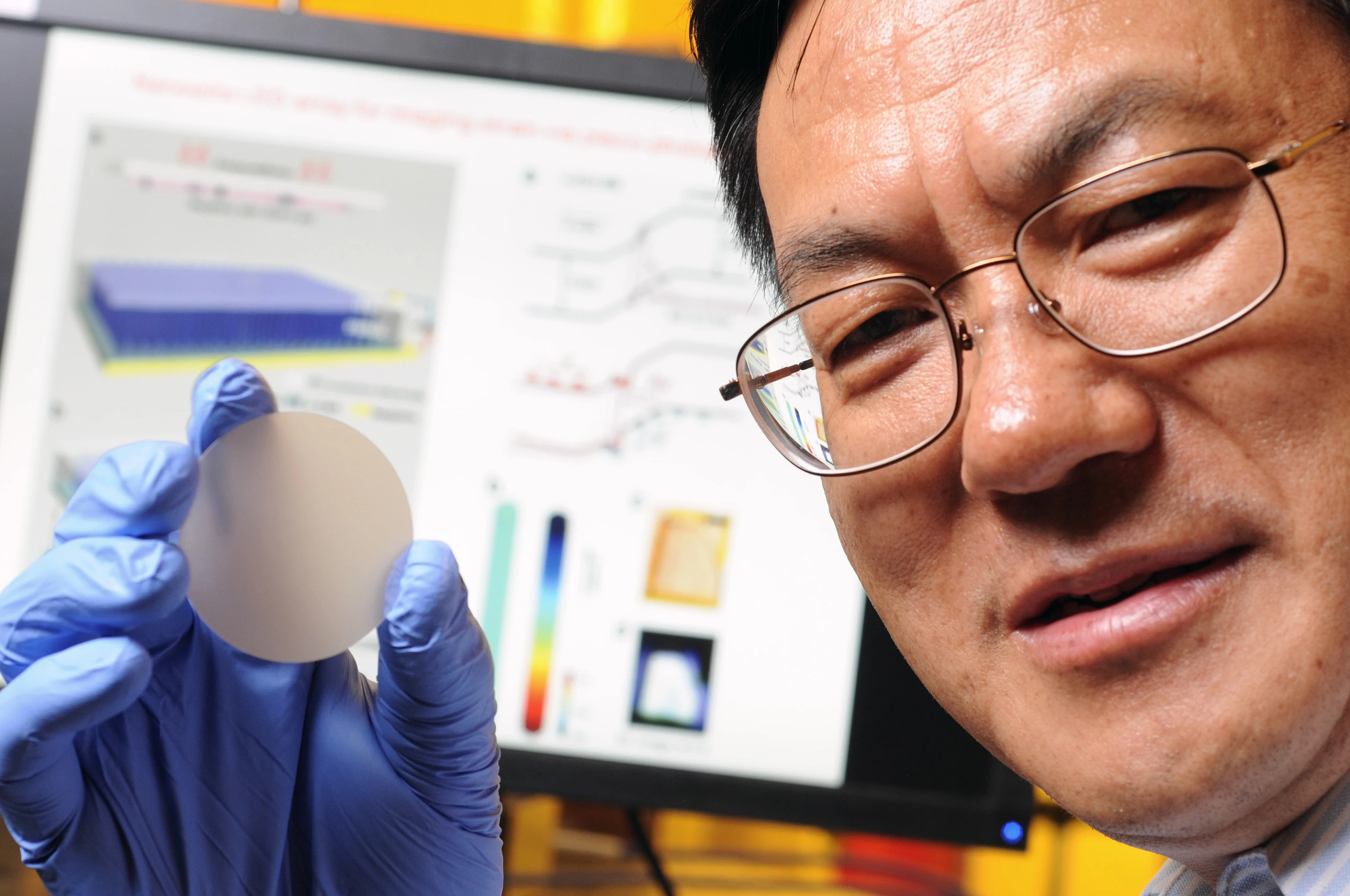 Prof. Zhong Lin Wang with one of the piezo-phototronic LED arrays