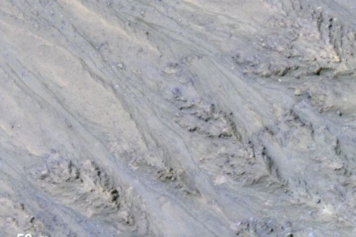 These dark streaks on Mars were once thought to be evidence of flowing liquid water, but a new NASA study suggests that might not be the case