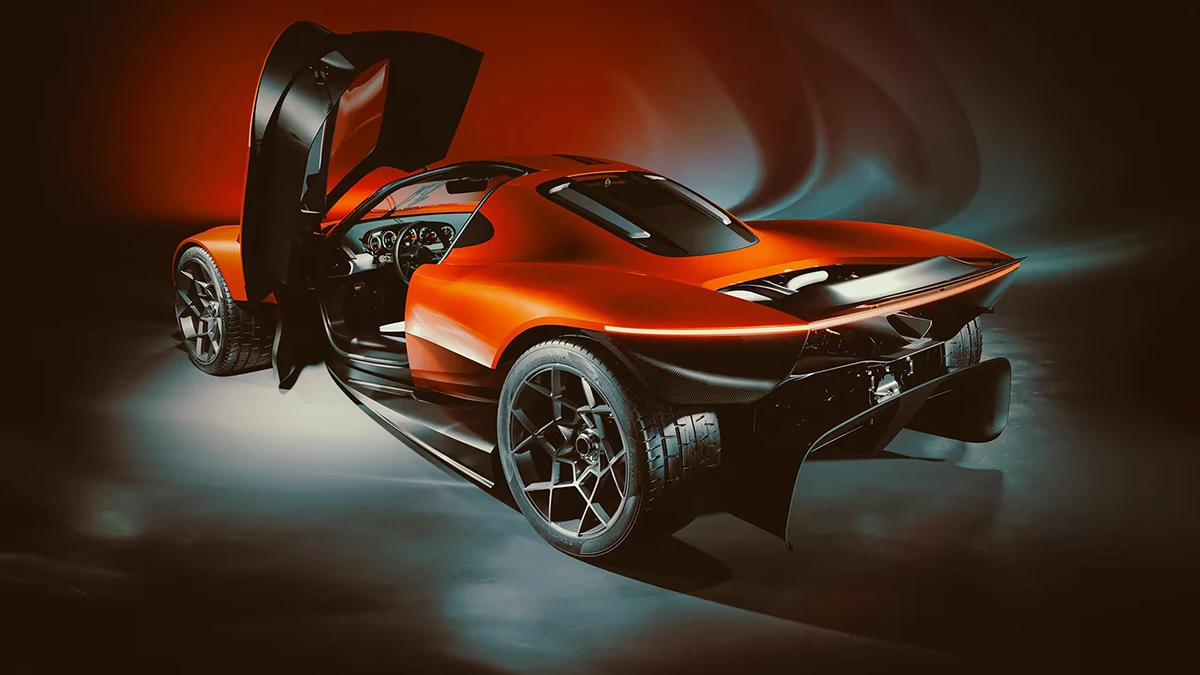 Feast your eyes on the exposed powertrain at the rear, the swing-up doors, and that stunning spoiler
