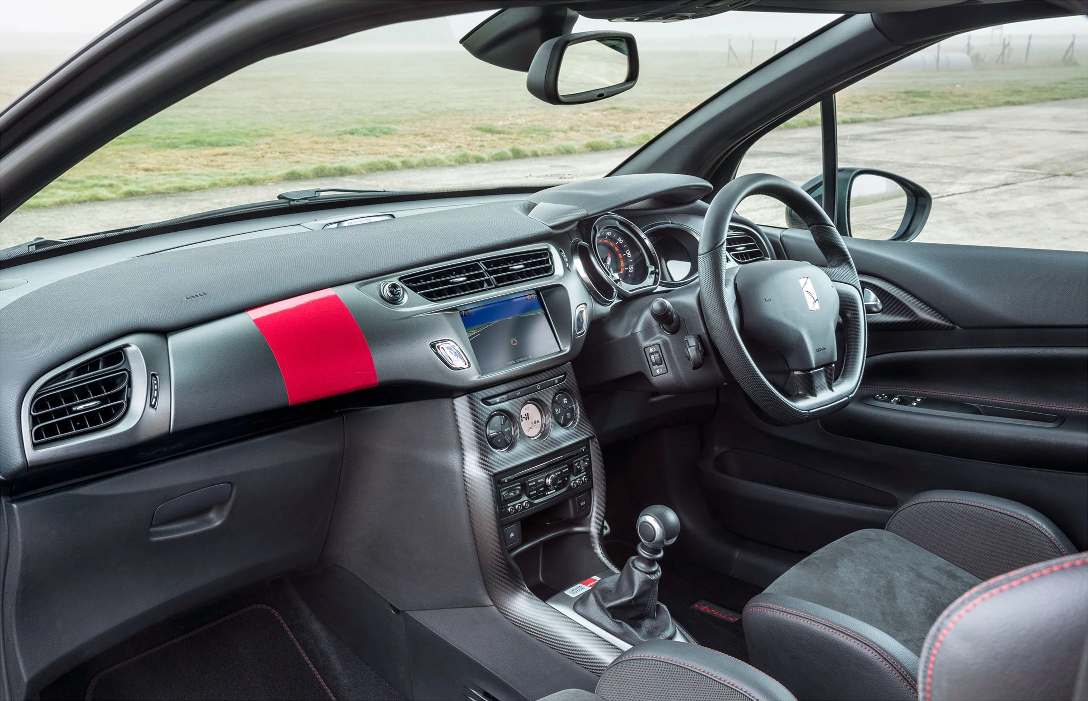 The DS3 Cabrio Racing gets the highest specification DSport trim, LED daytime running lights, automatic digital air conditioning, rear parking sensors, an RDS stereo radio/MP3 compatible CD player with steering mounted controls, a Bluetooth system with USB socket and an eight speaker sound system