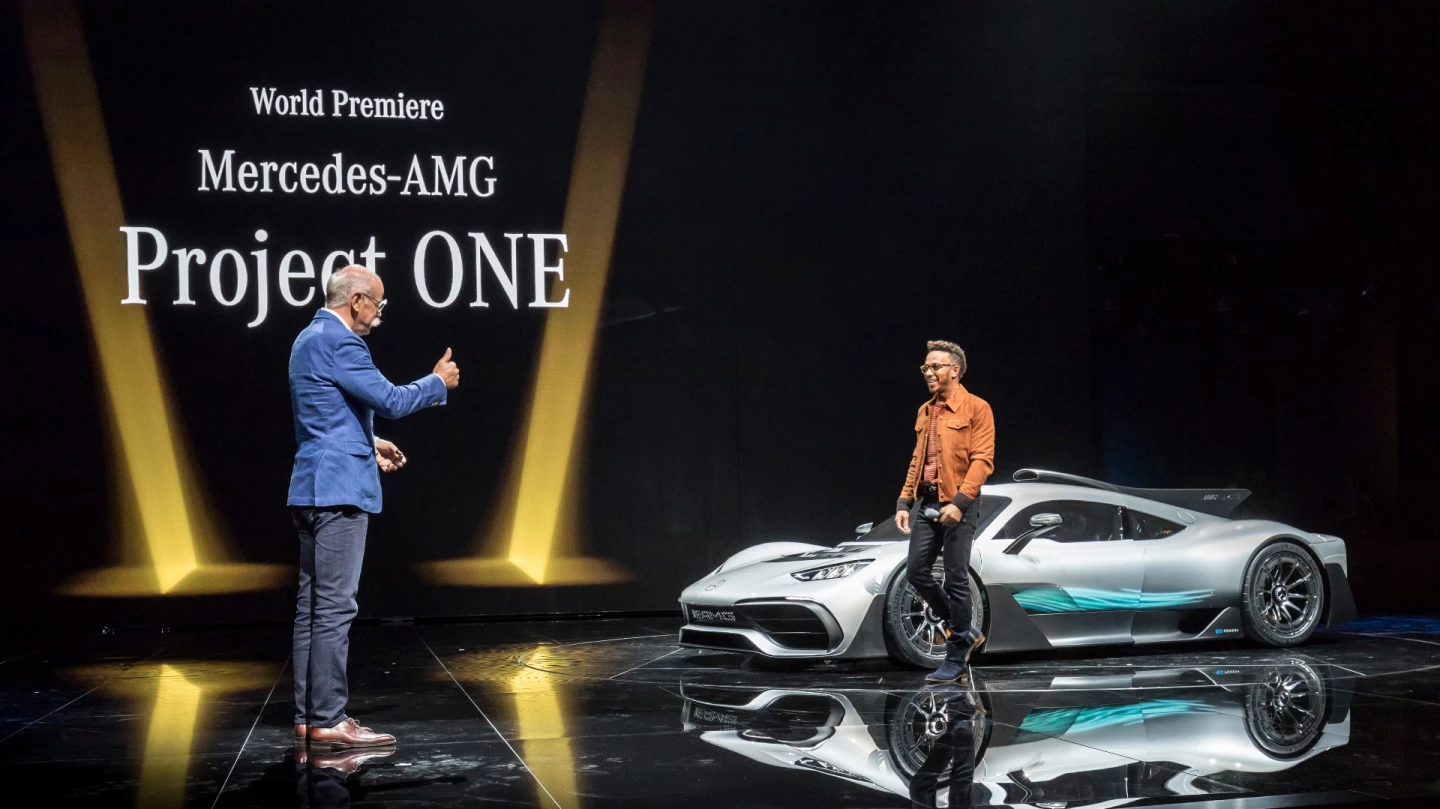 Dr. Dieter Zetsche, Chairman of Daimler AG and Head of Mercedes-Benz Cars, and the three-time world champion of the Formula 1, Lewis Hamilton, present the show car Mercedes-AMG Project ONE during the eve of the IAA.