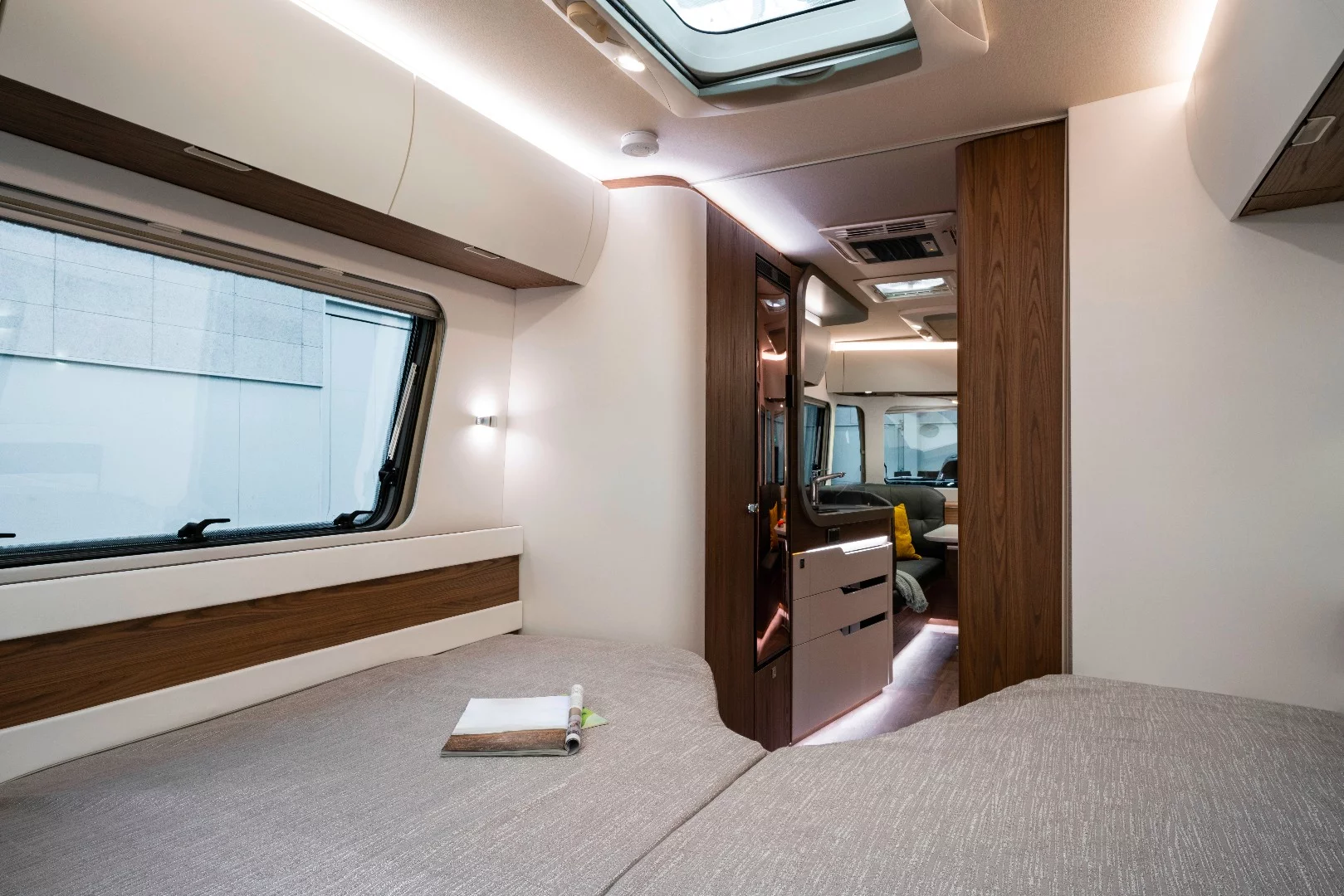 The rear bedroom has a V-shaped double bed