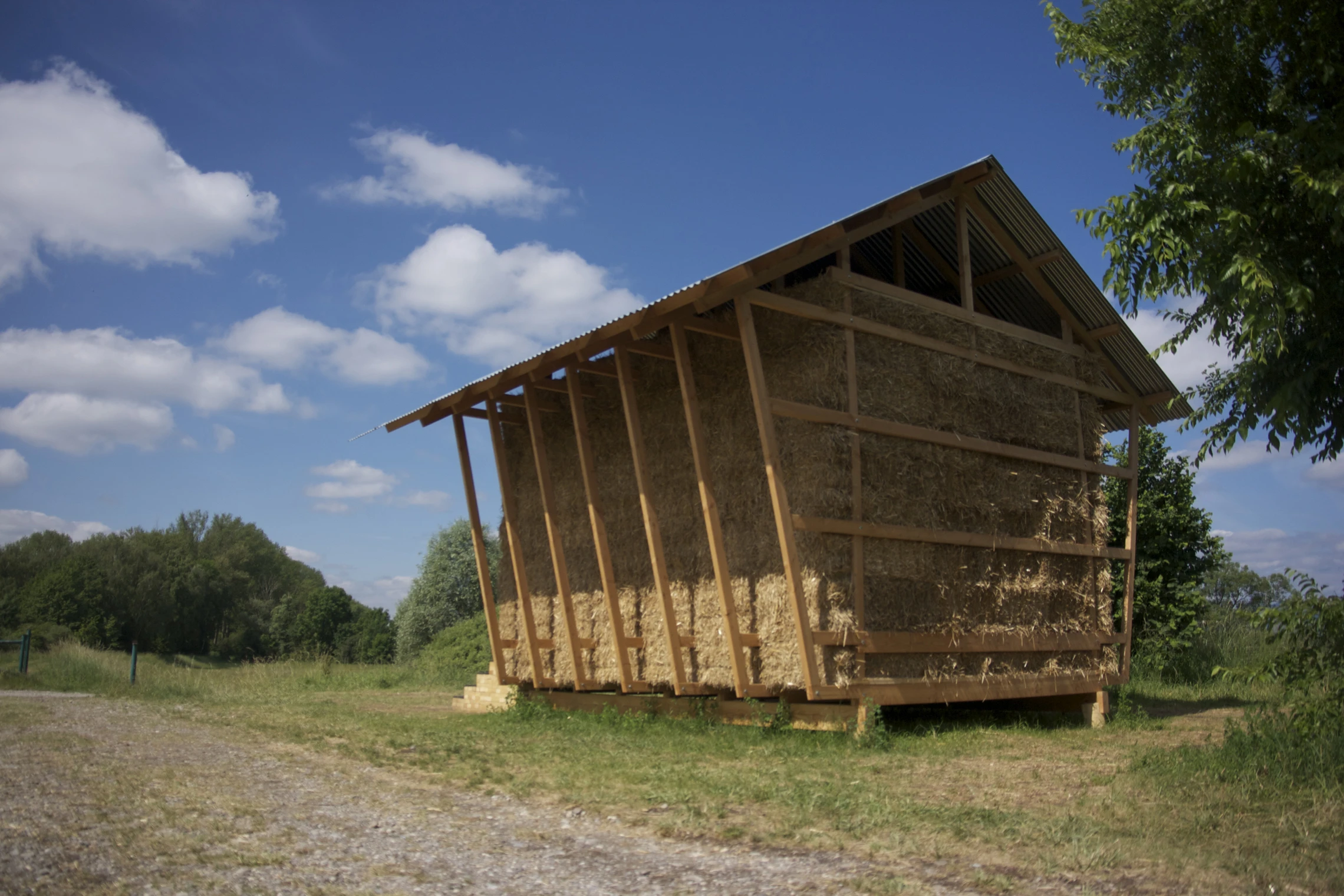 The Nest incorporates a simple quadratic structure that has been built using pastoral materials such as straw and wood