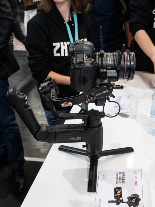 Zhiyun brought its prototype Crane 3 stabilizing gimbal rig to Photokina, which proposes a totally new ergonomic for the DSLR gimbal, complete with a lot of built-in controls