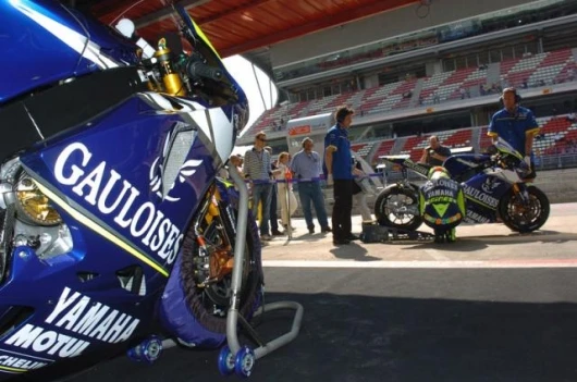 idiosynchratic in the extreme - Rossi's signature prayer stance before he mounts a racing motorcycle