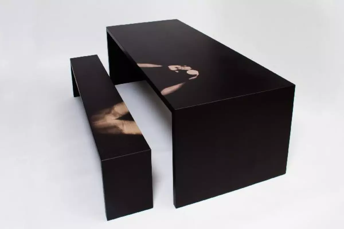 A new thermochromic table and bench set changes color wherever it's exposed to the user's body heat