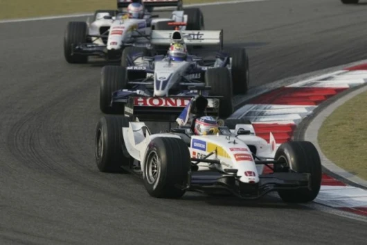 The BAR Hondas of Button and sato sandwich the Williams of Klien