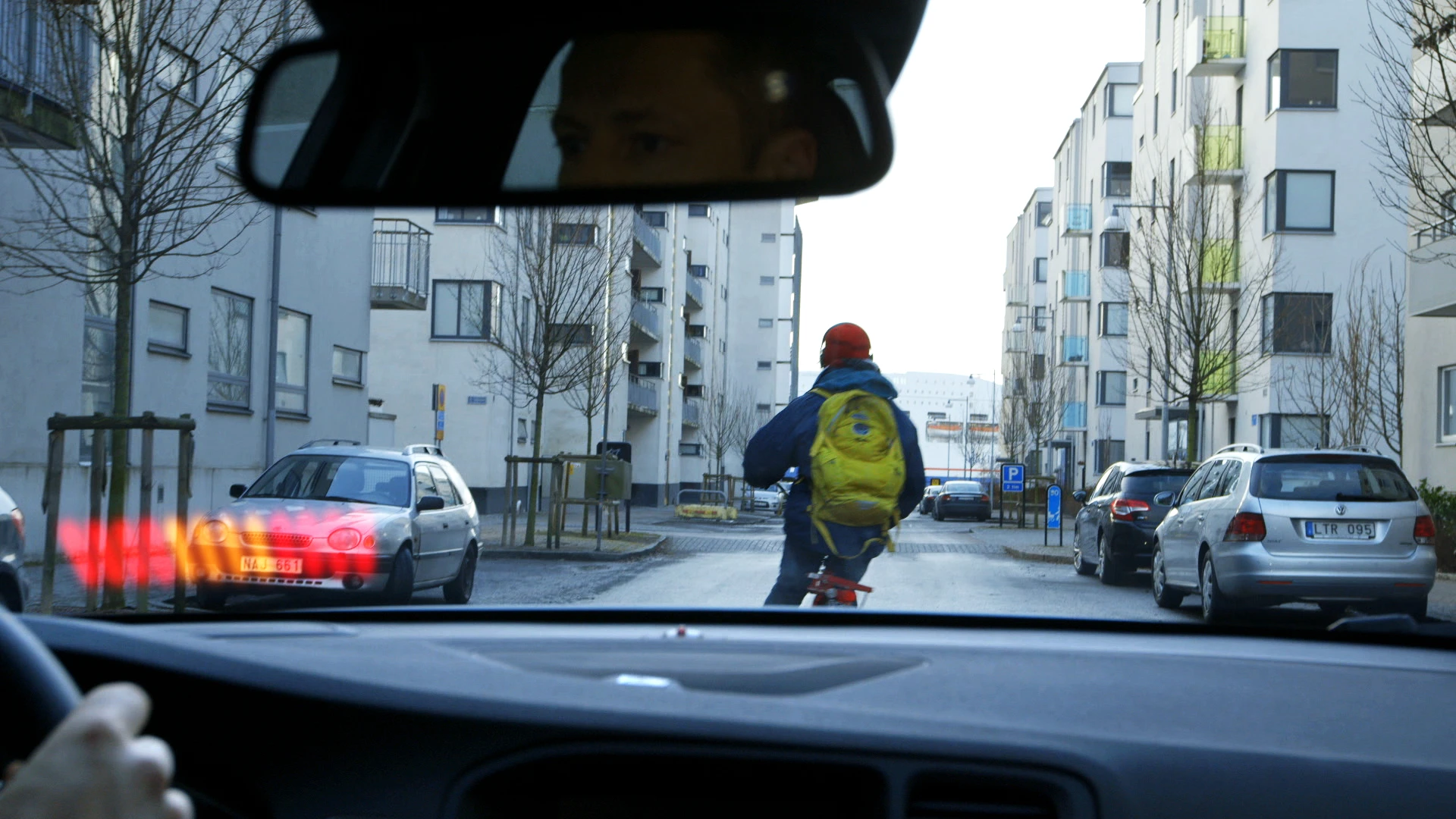 Volvo's Pedestrian and Cyclist Detection with full auto brake system displays a red warning on the windscreen and applies the brakes to prevent a collision
