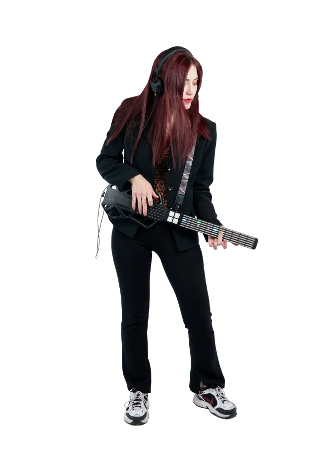 The neck features pressure-sensitive LED buttons to light up the way to easy learning, or to animate your playing