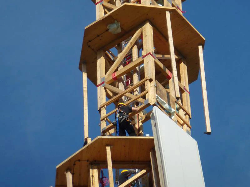 The TimberTower consists of a linked system of glued laminated timber panels that are built around a wood frame
