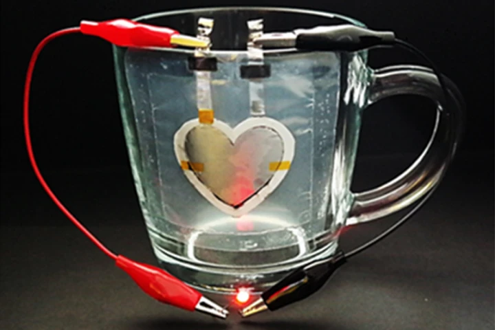 The heart-shaped battery printed onto a glass cup is capable of powering an LED