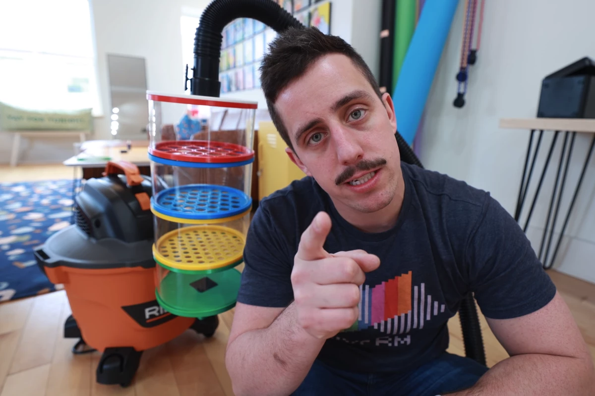 Matty Benedetto with his suck 'n' sort vacuum attachment for Lego lovers