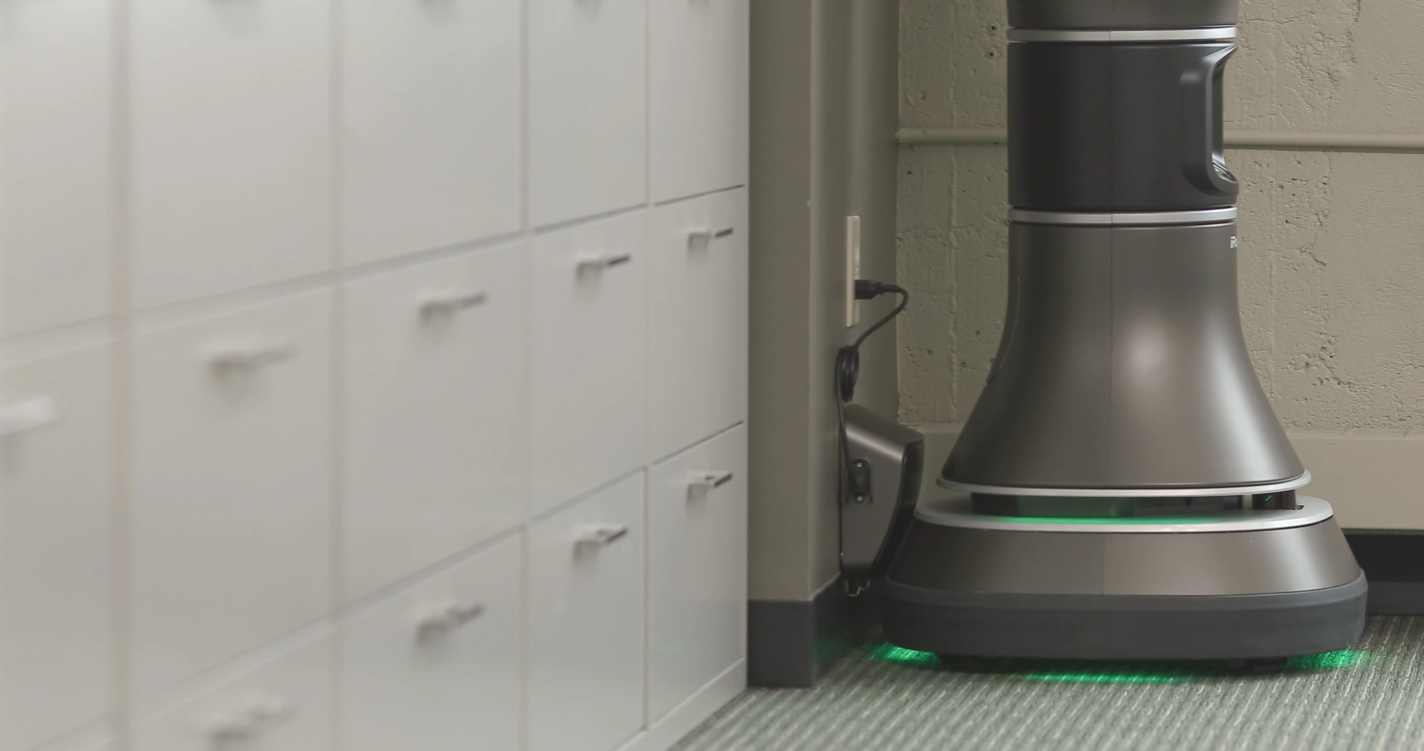 The iRobot Ava 500 at its charging dock