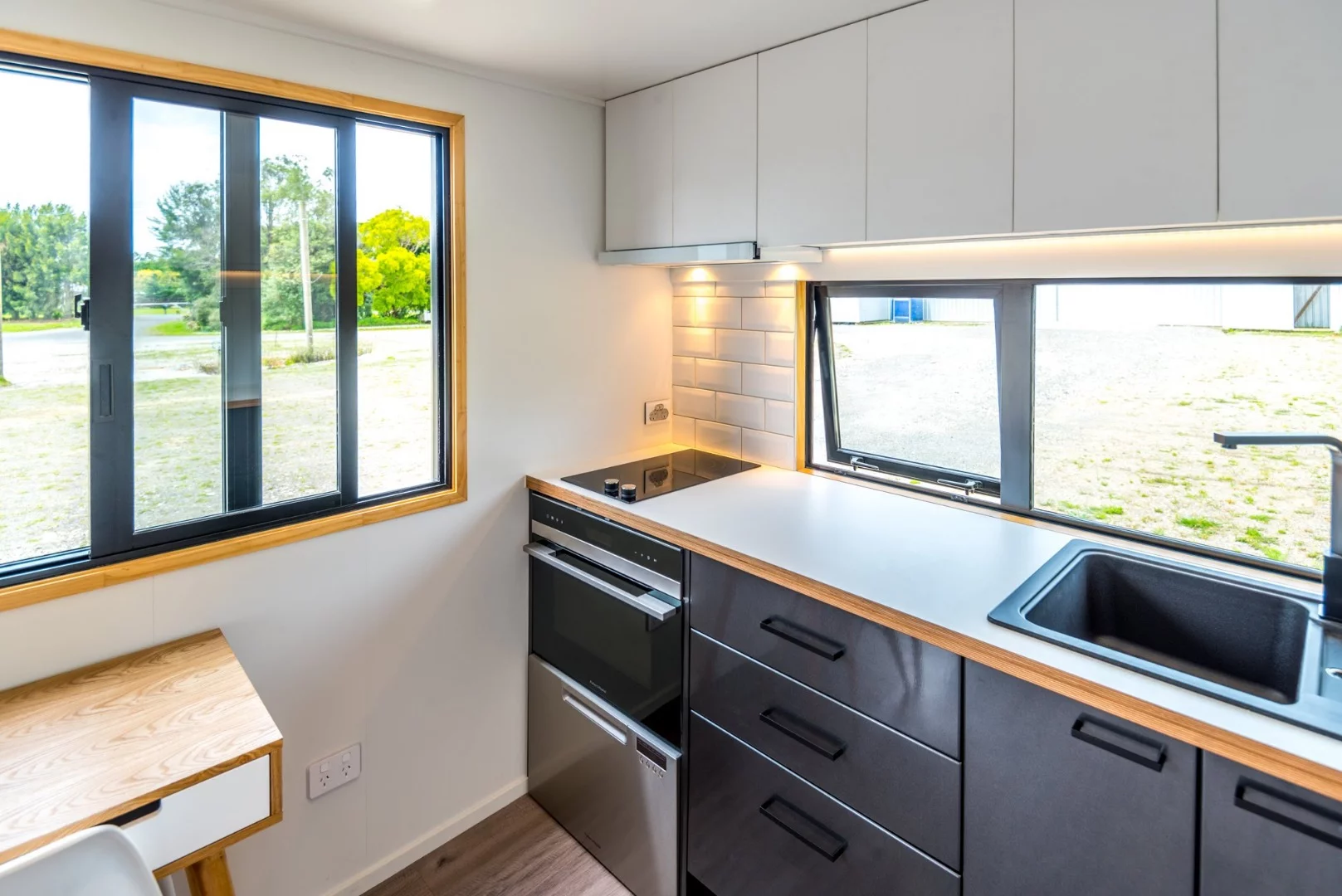 Large windows feature throughout Pohutukawa kitchen