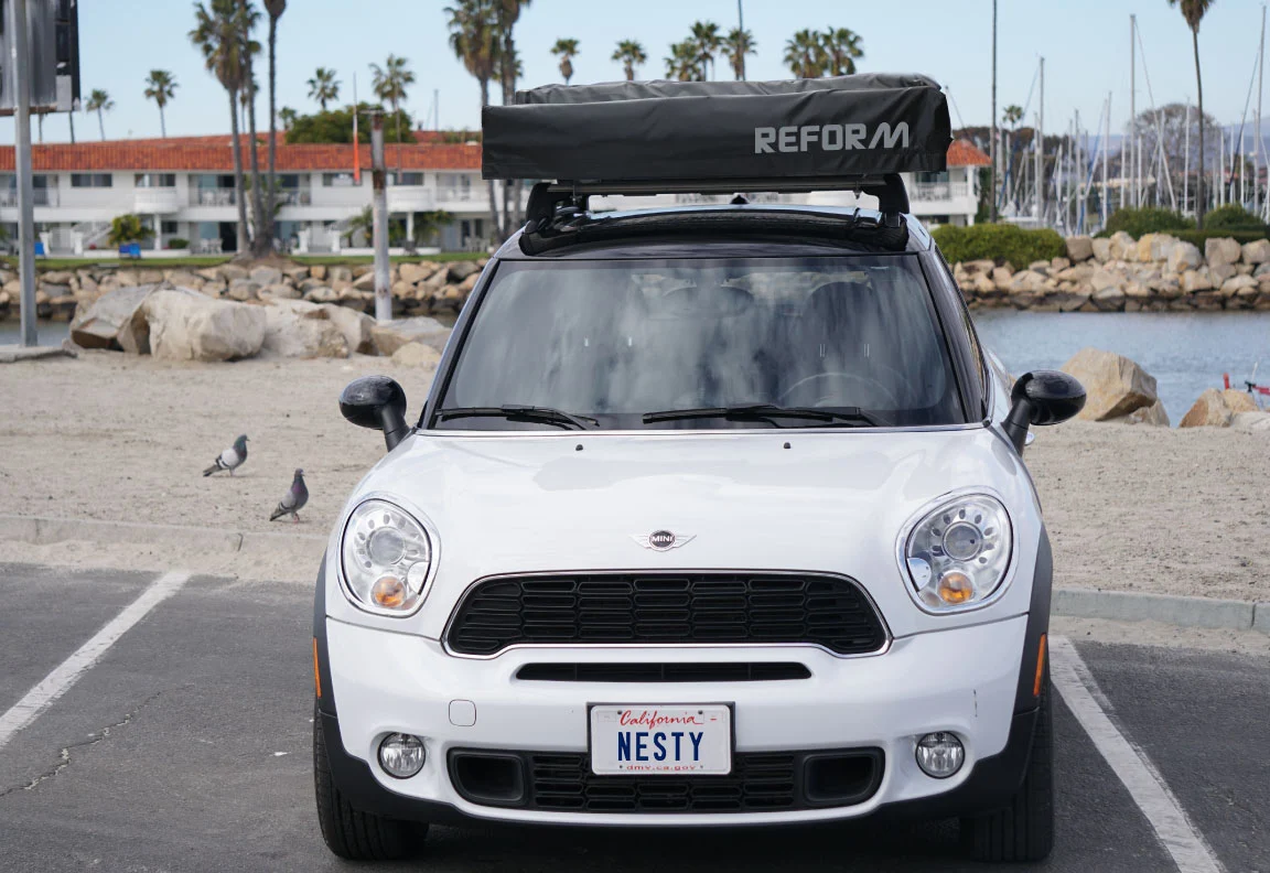 The Nesty roof-top tent is designed to be a road trip adventure alternative