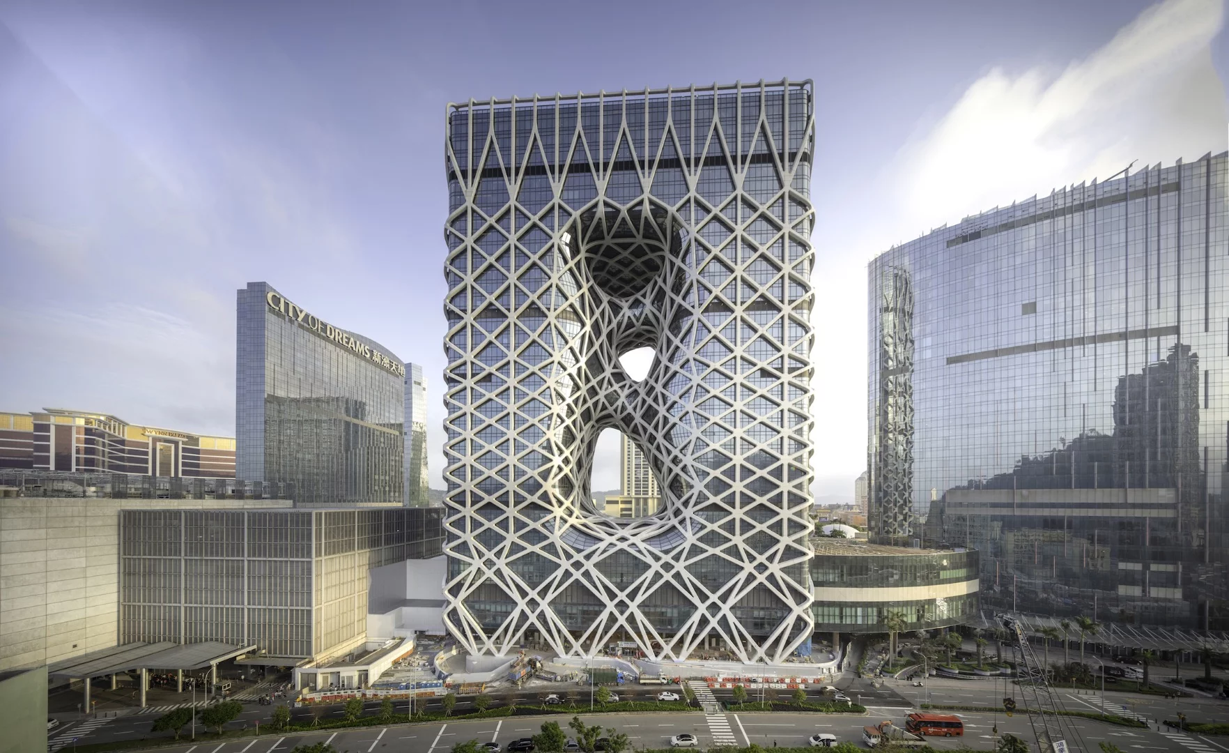 Morpheus Hotel is wrapped in a steel and aluminum exoskeleton that provides structural support