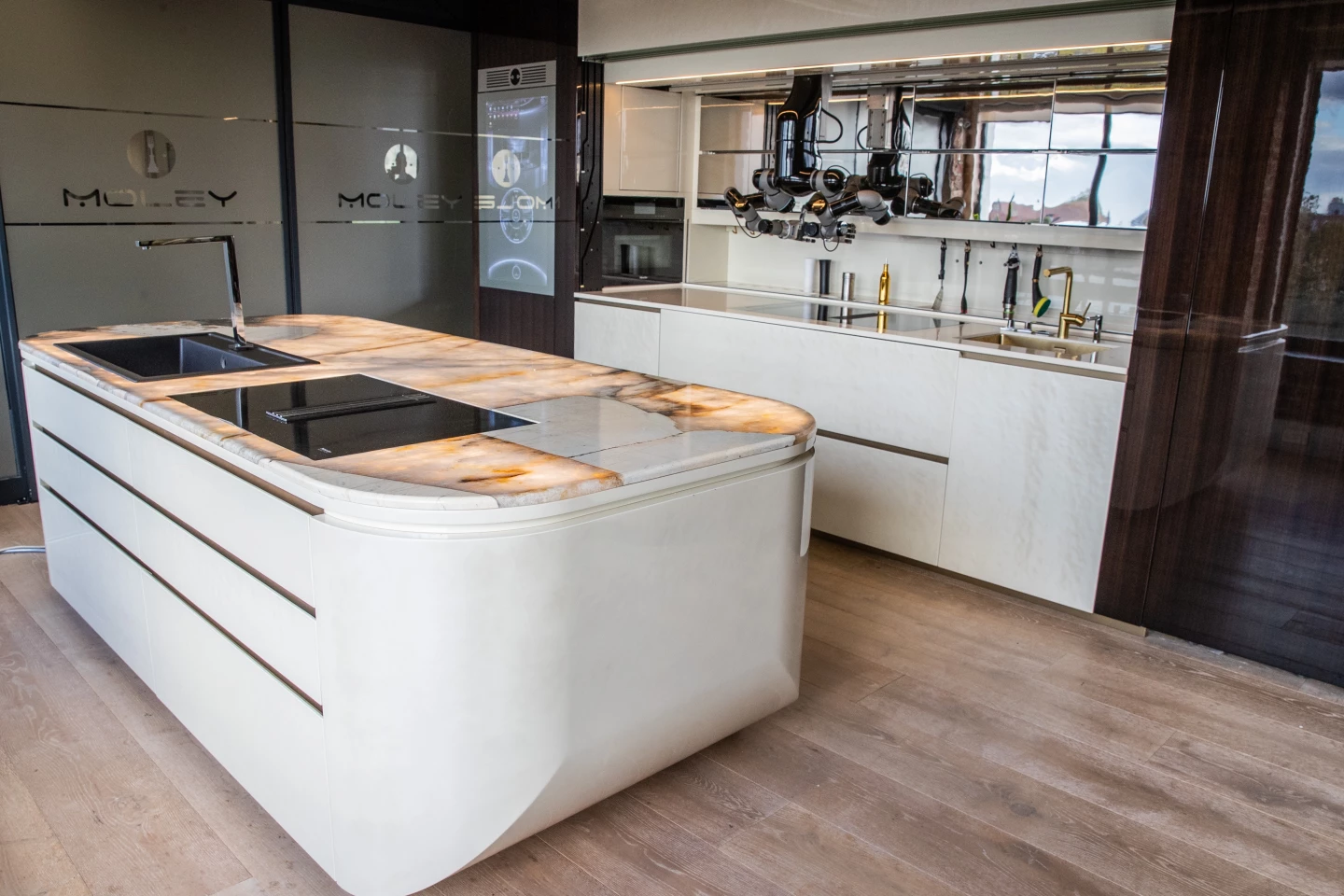 Moley's kitchens are designed to be used by both its robotic meal-preparation system and homeowners themselves