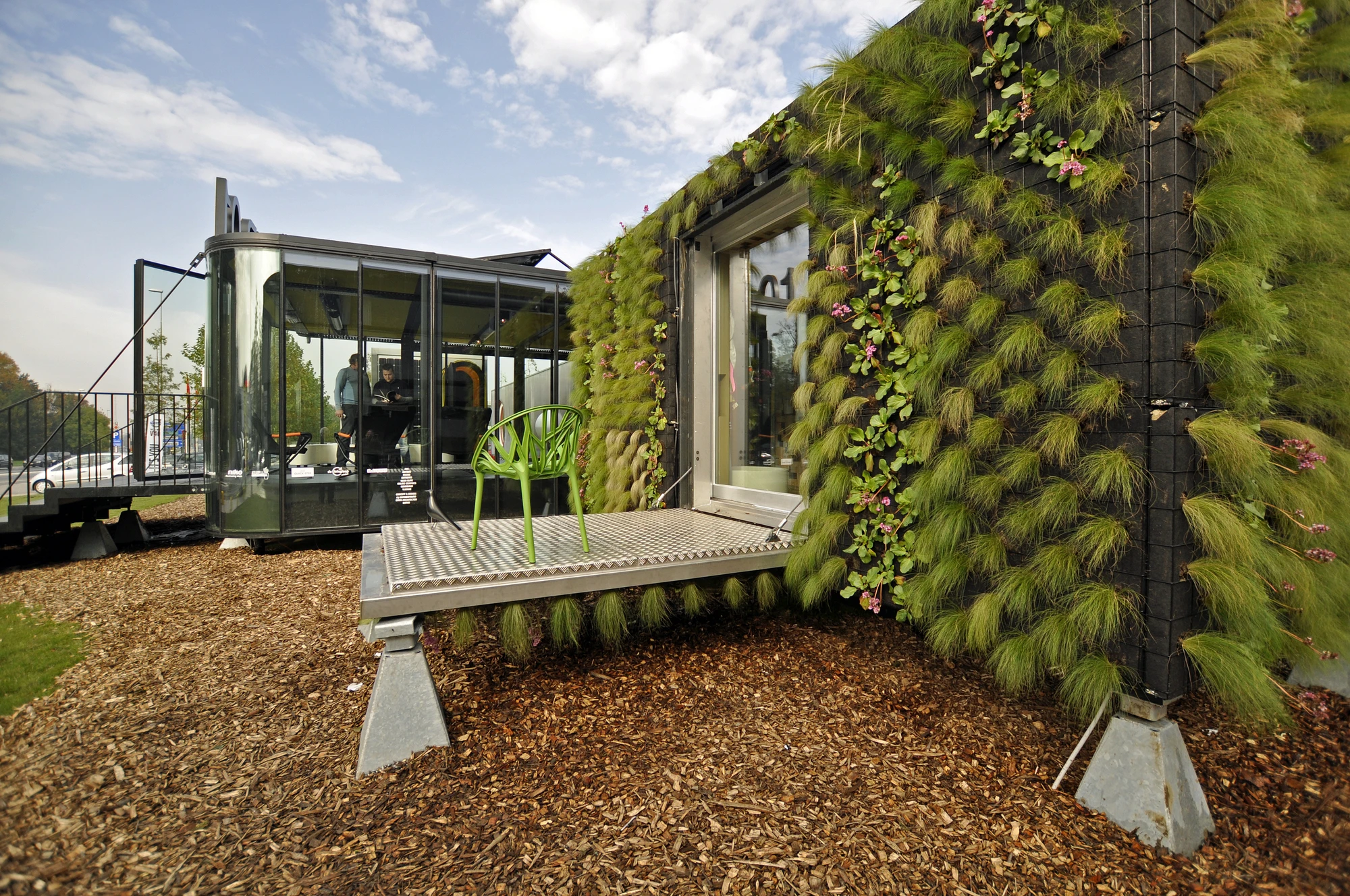 Designed by architectural studios dmvA Architecten and A3 Architects, Hub_01 boasts several modern flexible living modules