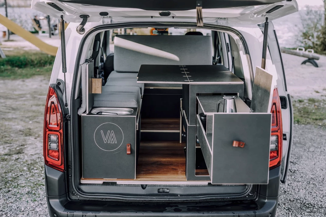 Vanderer's fold-out table and lifting base create a dining area