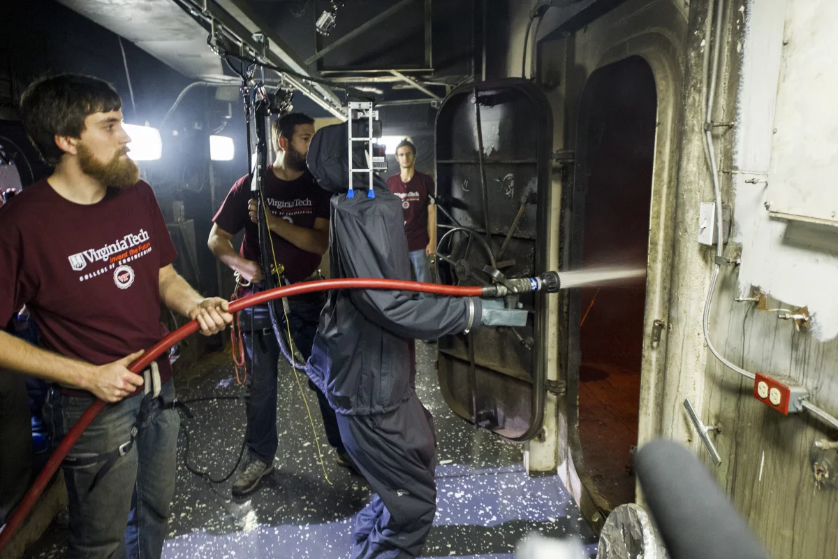 SAFFiR in a rain suit putting out a shipboard fire (Photo: US Navy)