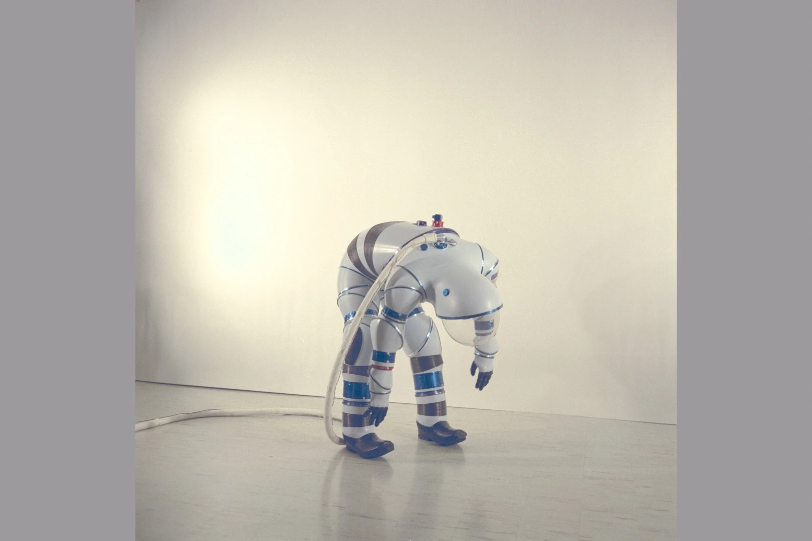 A hard suit showing how far it can bend