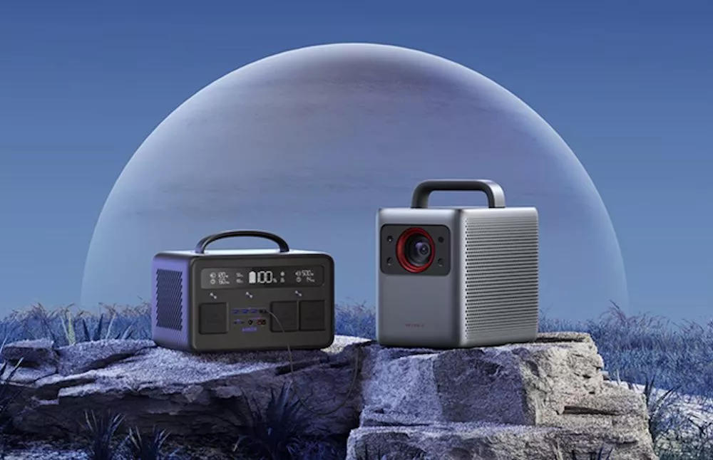 The Nebula Cosmos Laser 4K projector doesn't have its own battery so will need to be placed near a wall outlet, or connected to a portable power station like the Anker 545 shown