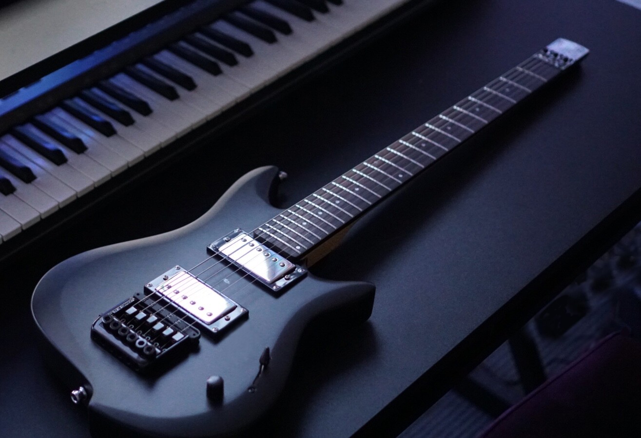 Compact digital guitar gets bigger and better brother